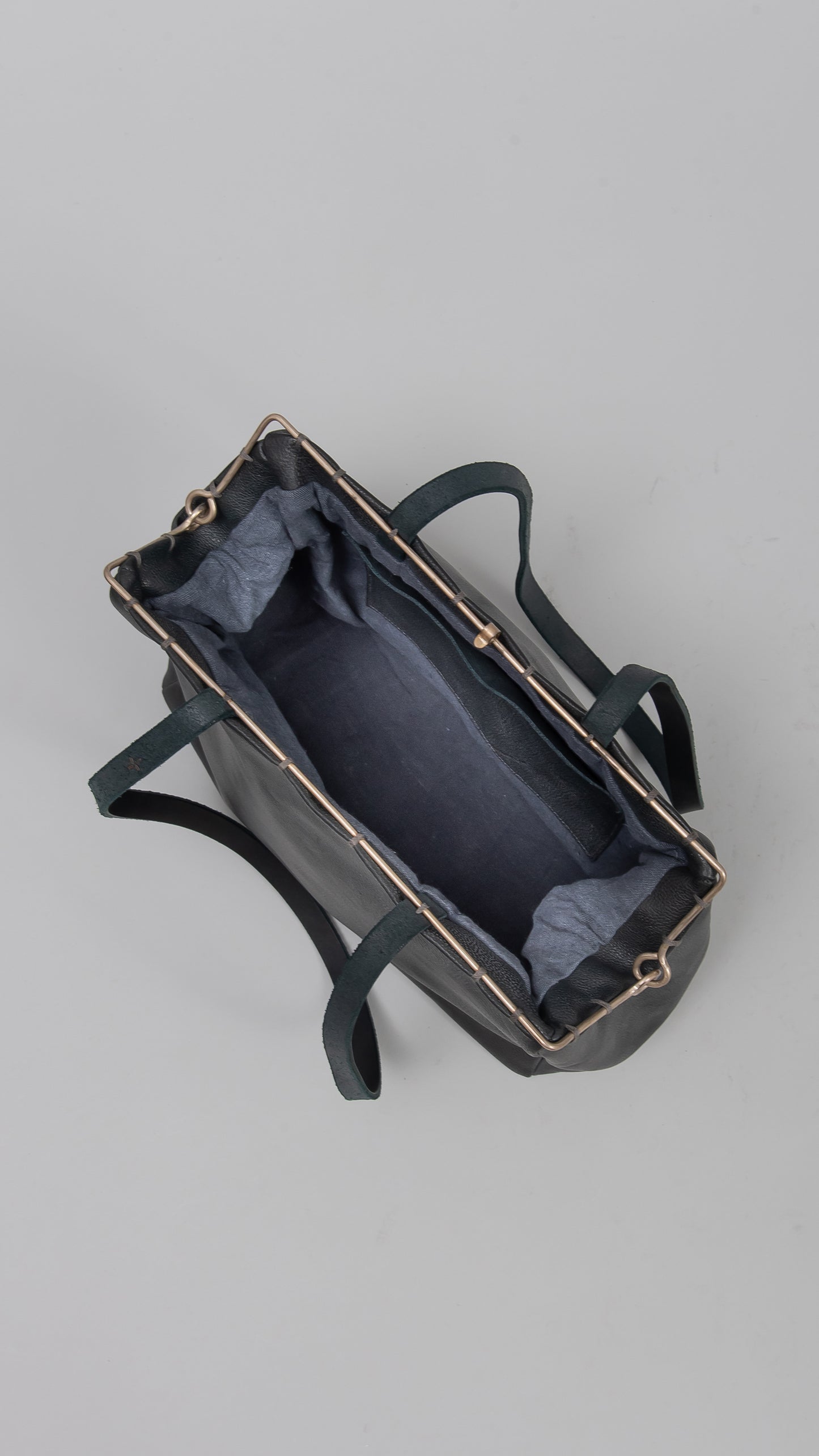 silver rim flat shoulder bag