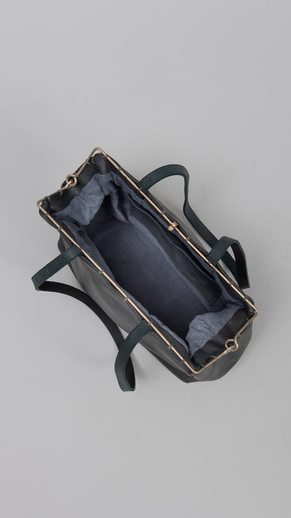 silver rim flat shoulder bag