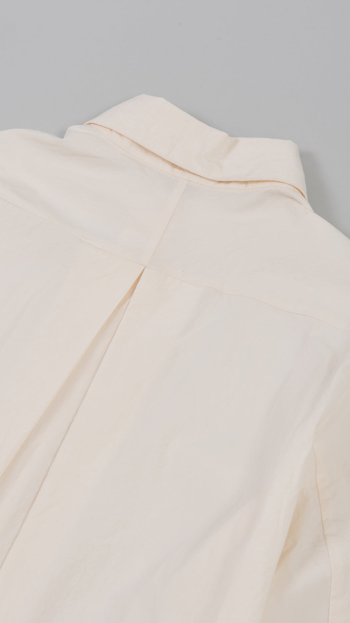 wo. wide back pleat long shirt