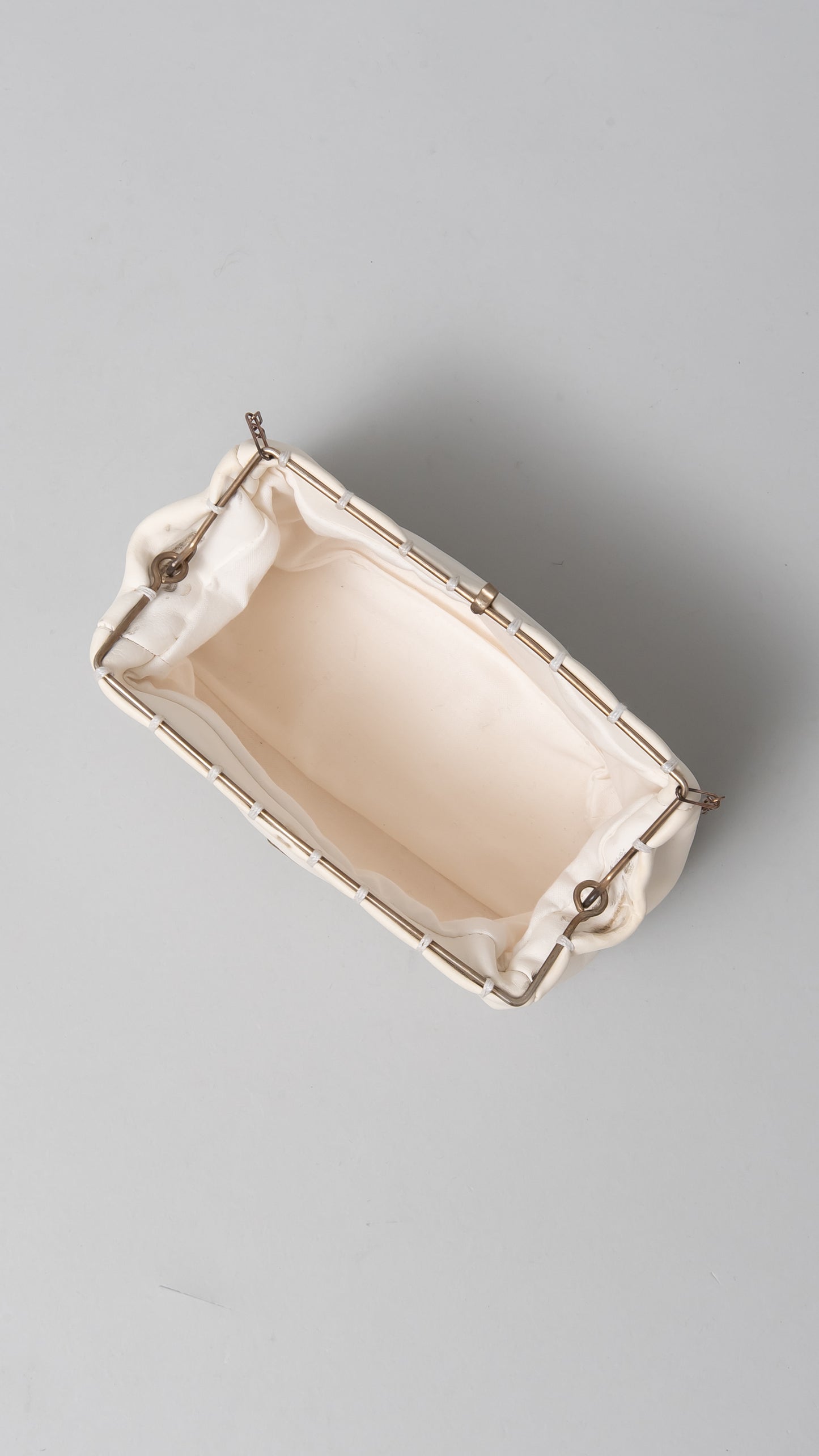 extra small silver rim hand bag