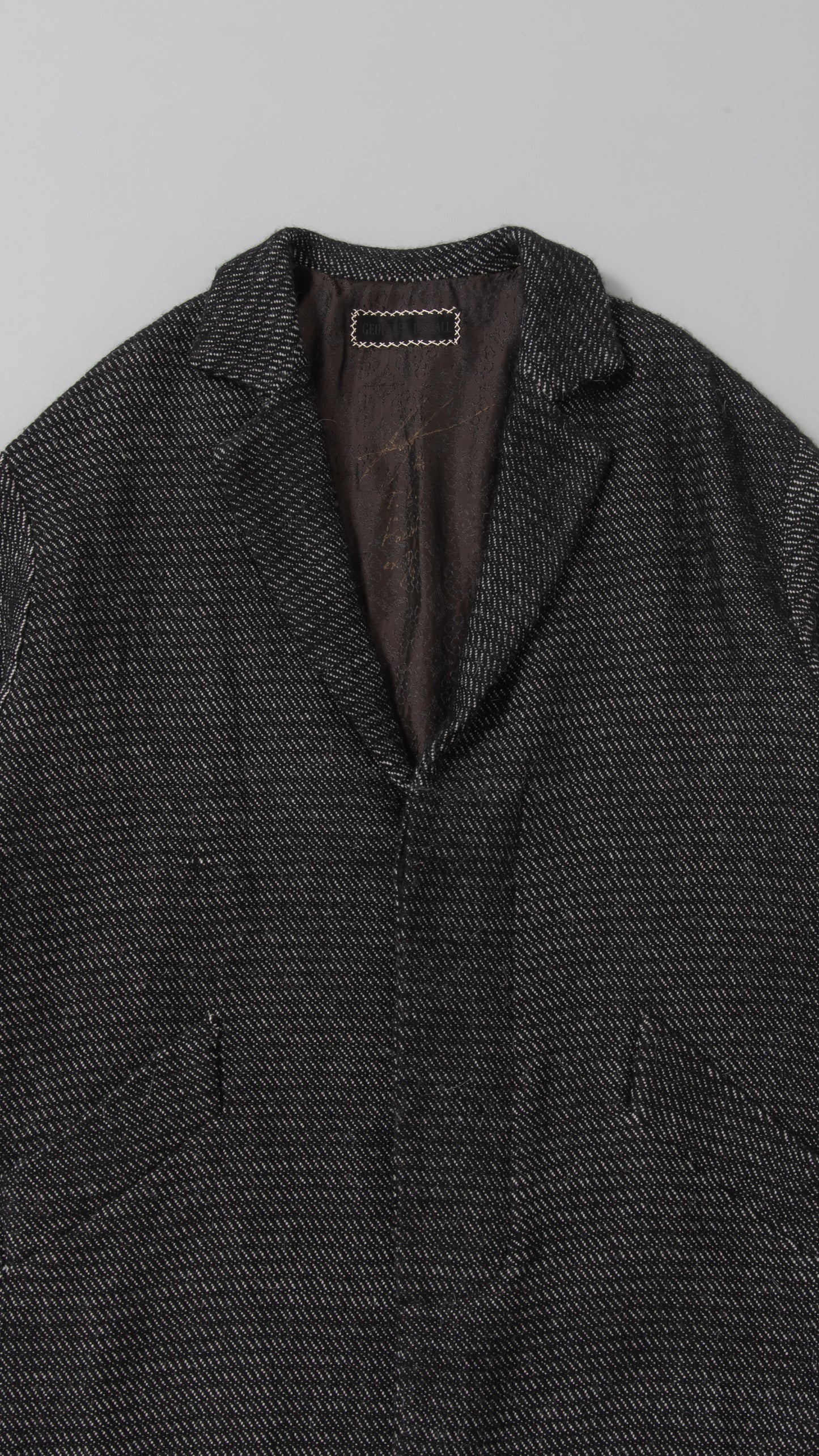 peak-lapel coat
