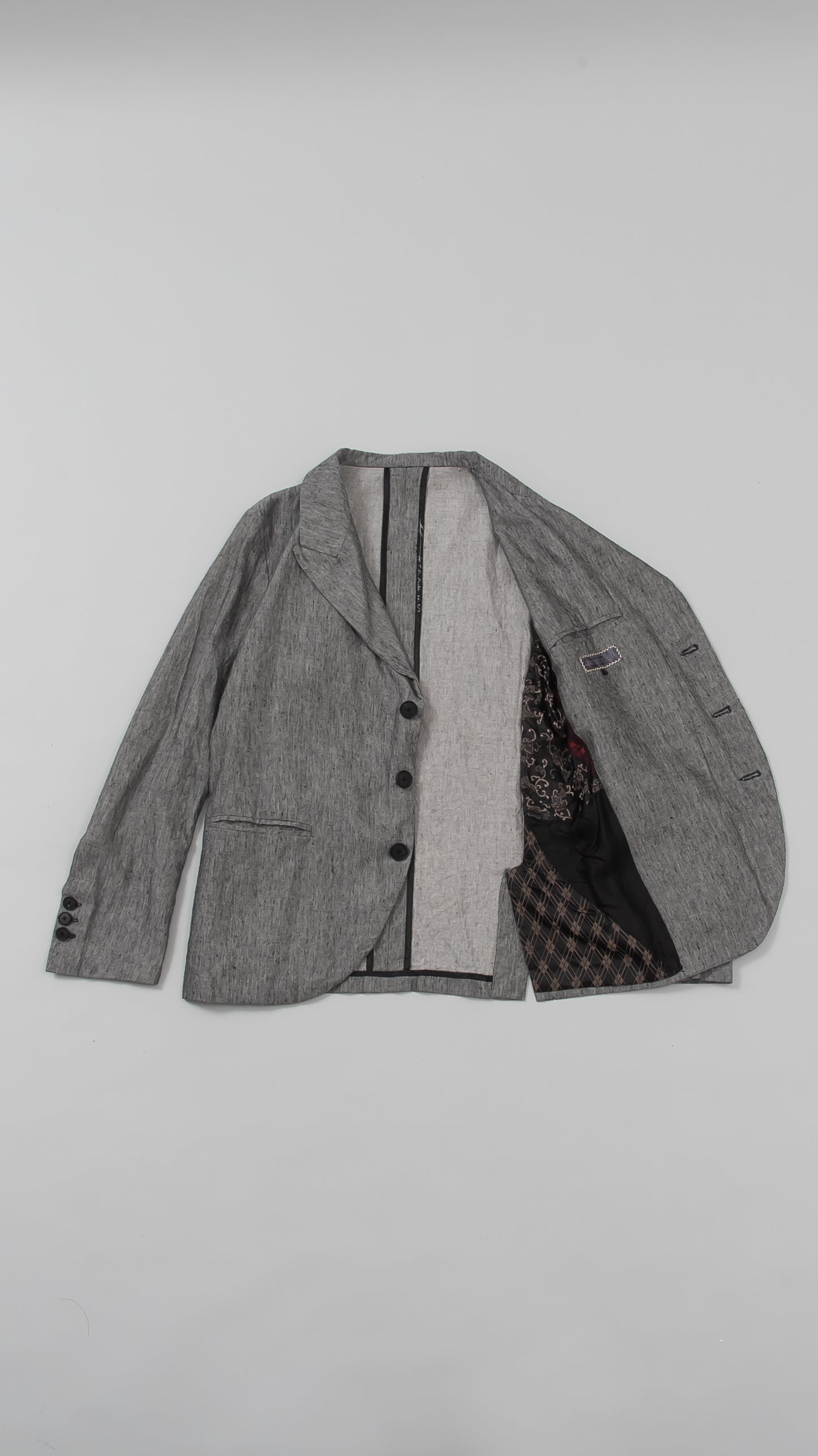 peak-lapel coat