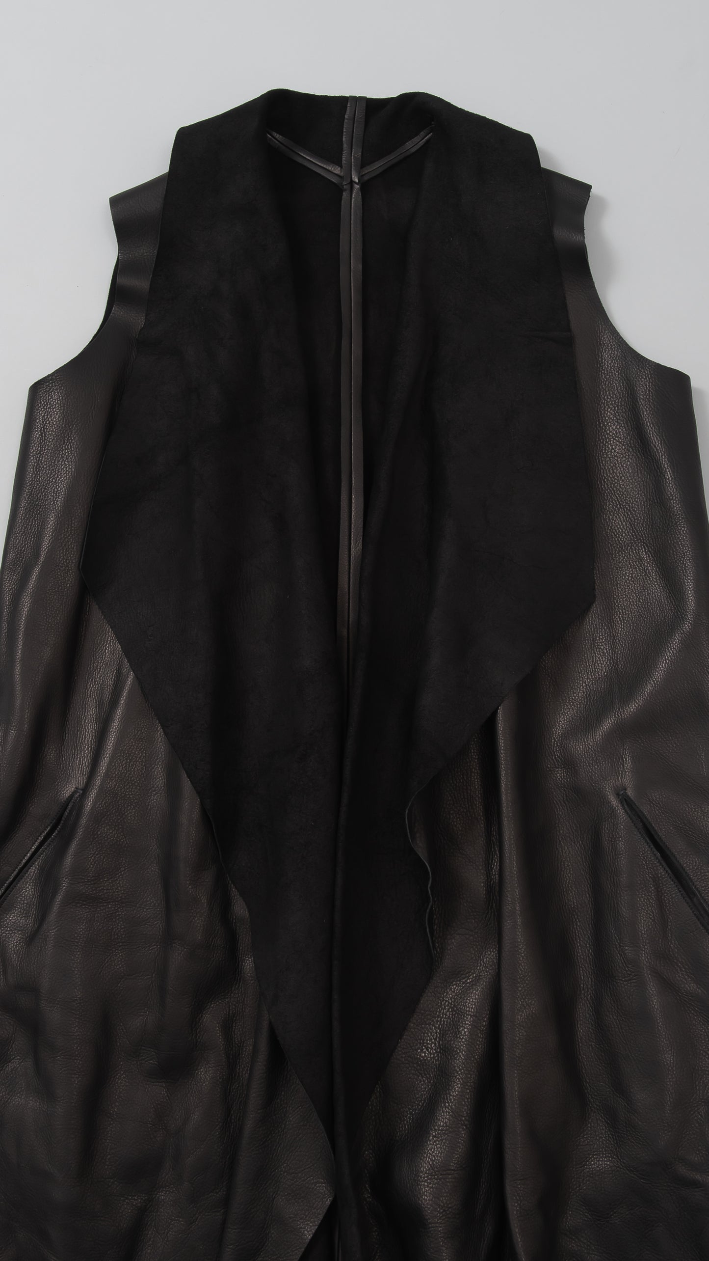 sleeveless open wide coat